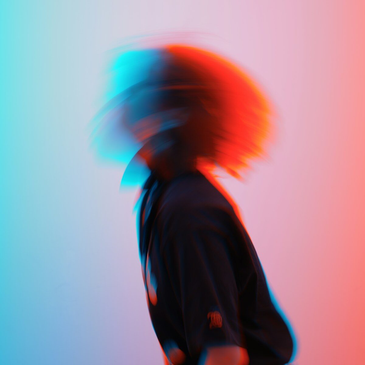 A blurry photo of a person with a skateboard