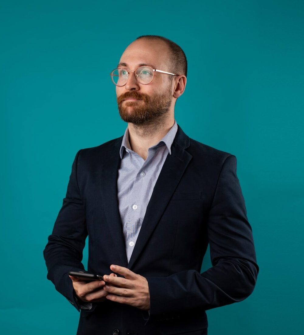 man wearing black suit